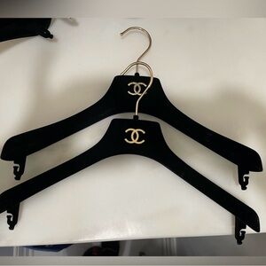 CHANEL Black Hangers with Gold Accents